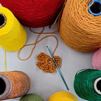 Workshop bloemenbroche haken bij:  tentoonstelling Terra Terra Bindweefsel