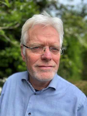 Uitnodiging afscheidssymposium aangeboden aan Dick van der Wouw