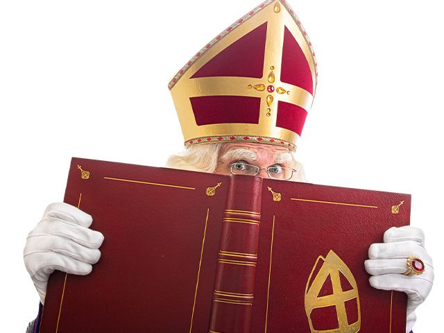 Sinterklaas leest voor in de Bibliotheek