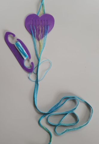 Weef een armbandje | Nes Ameland