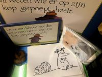 Over een kleine mol die wil weten wie er op zijn kop gepoept heeft - Voorleeskist