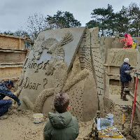 Demonstratie opbouw zandsculptuur in de Bieb