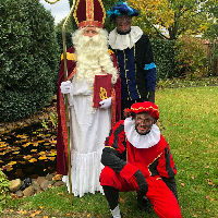 Sint en Pieten op bezoek in bibliotheek Mierlo